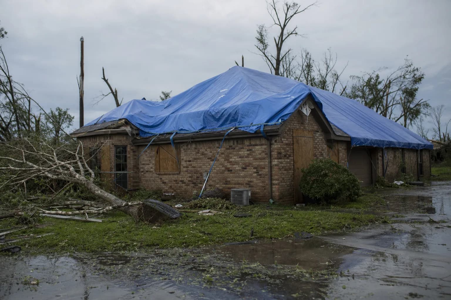 Home exterior after fire damage with temporary housing needs during rebuild